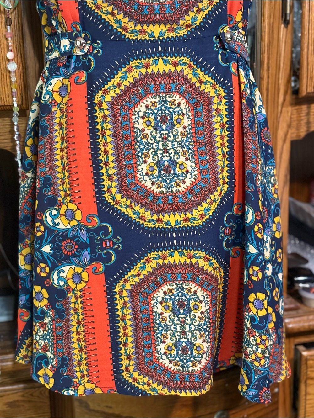 bohemian printed sleeveless dress defined cinch waist flowy mini-length skirt. - Picture 10 of 16